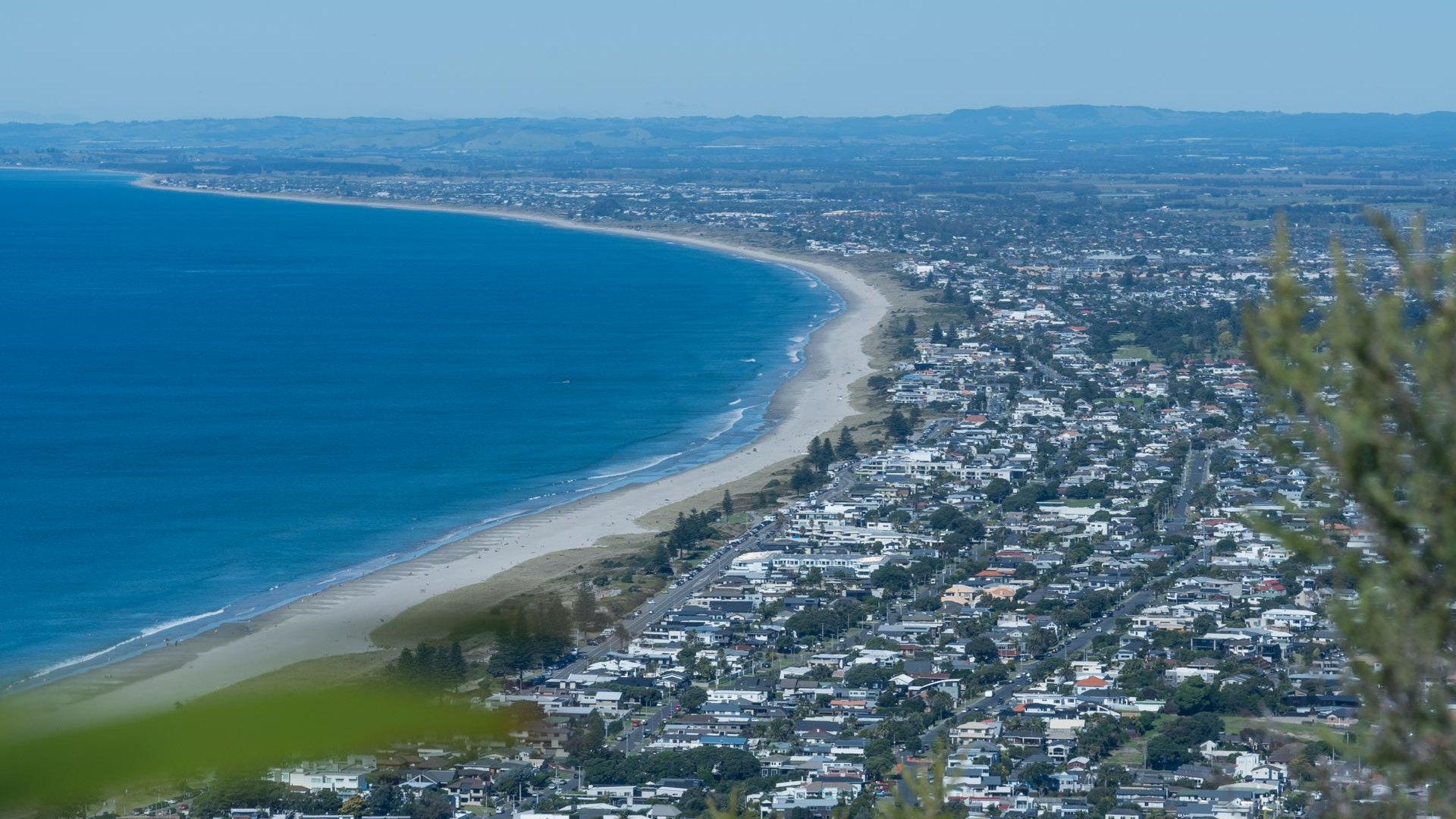 Mount Maunganui beach and township seen from Mauao